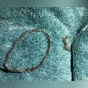 Sterling silver ring and bracelet set with diamonds